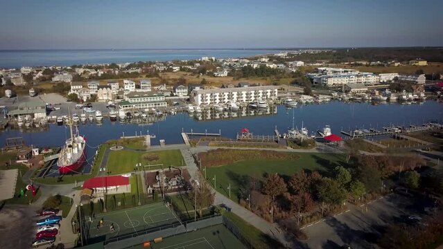 Lewes Delaware drone flyover descending autumn harbor

