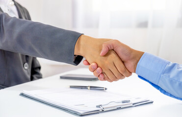 handshake after Office executives interviewing job applicants in the meeting room. employer conversation summary work employment