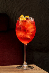 tasty cocktail on the wooden background