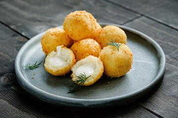 mozzarella balls on the dark background