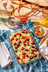 Picnic time - homemade orzo pasta salad with feta, olives, tomatoes