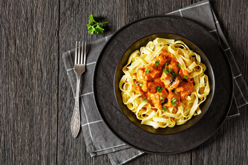 Creamy Paprika Pork Chunks over tagliatelle noodle
