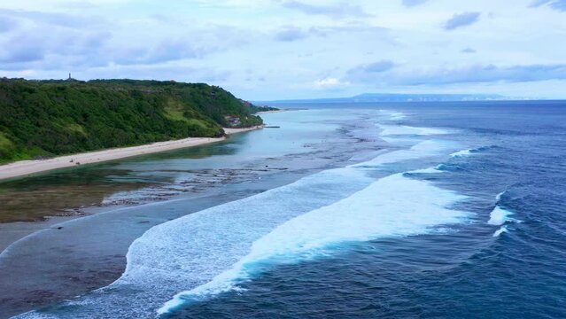 White Foamy Waves Of Pantai Gunung Payung Beach In Southern Bali, Indonesia. Aerial Drone Shot