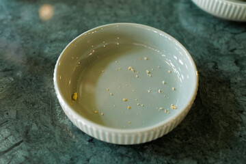 Close up butter cookie crumb in green dish