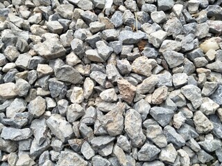 pebbles that function to withstand flooding in the yard of the house