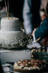 White wedding cake placed on the table