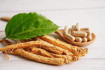 Ginseng roots and green leaf, healthy food.