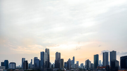 Fototapeta na wymiar Panoramic Jakarta skyline with urban skyscrapers in the afternoon