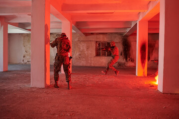  A group of professional soldiers bravely executes a dangerous rescue mission, surrounded by fire...