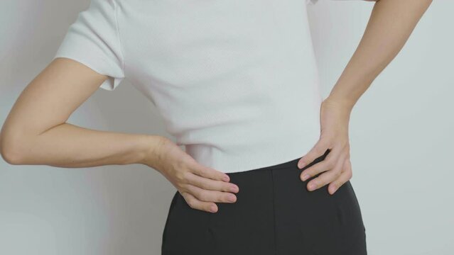 Woman having back pain. Urinary system and Stones, Cancer, world kidney day, Chronic kidney stomach, liver pain and pancreas concept