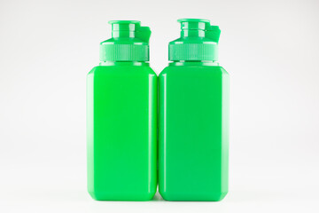 green plastic medical jars with lids