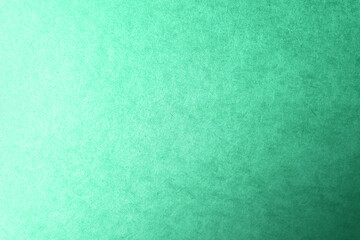 Blank natural green tone or teal color gradation paint on recycled environmental friendly cardboard box kraft paper texture background with space minimal design style