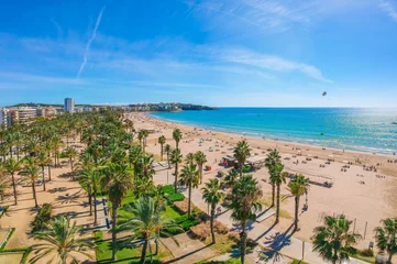 Fotobehang Beach in Catalan city Salou, Spain, Europe. Sea and palm in Catalonia © oleg_p_100
