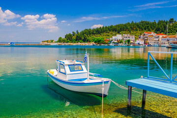 Fototapeta na wymiar Sea, traditional Greek boat in Limenas, Thassos island, Greece, Europe