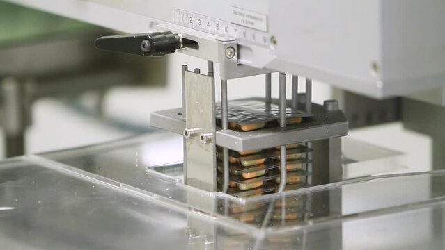 Pharmaceutical industry close up. Pills and tablets production. Medical factory equipment