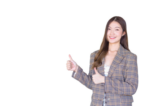 Asian professional woman with black long hair wearing plaid suit and pretty smilingwhile present product thumbs up means good while isolated on white background.