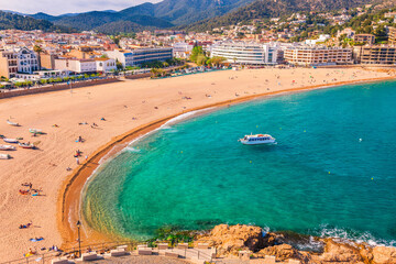 Beach and cityscape in Tossa de Mar in Catalonia, Spain, Europe