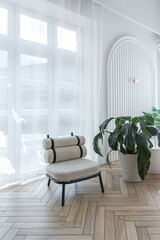 spacious open-plan apartment with stylish modern bright design, dressing area, bedroom, living room and bathroom on a sunny day