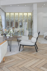 spacious open-plan apartment with stylish modern bright design, dressing area, bedroom, living room and bathroom on a sunny day