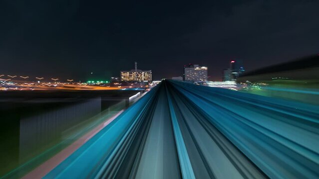 4K Hyperlapse of automatic train moving to city with out stop at station, Tokyo, Japan 
