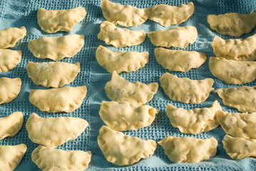 step by step making blueberry dumplings pierogi varenky at home. Process of making traditional...