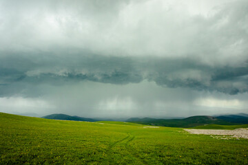 Mountain landscape during stormy weather