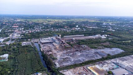 Solar cells farming beside with rivers and factories in industrial area. Green World concept with the ecosystem with technology recycling.
