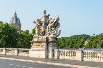 Fototapeta na wymiar Statue on Ponte Umberto 1 bridge to Trastevere district in Rome
