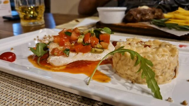 White fish steak and rice. Restaurant