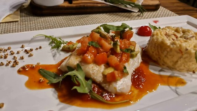 White fish steak and rice. Restaurant