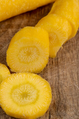Pieces of sliced peeled carrots are yellow