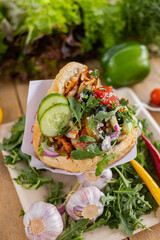 Kebab in bun with fresh vegetables