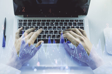 Abstract creative stats data concept with hands typing on laptop on background. Multiexposure