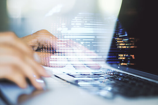 Double exposure of abstract creative programming illustration with world map and hand typing on laptop on background, big data and blockchain concept