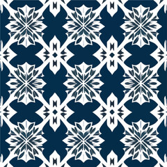 Fototapeta premium Serene blue and white pattern features snowflakes gracefully arranged in a symmetrical manner. This seamless and delicate damask pattern, often used in fabric design, captivates with.