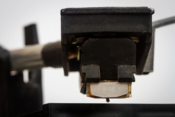 Close up of turntable needle on a vinyl