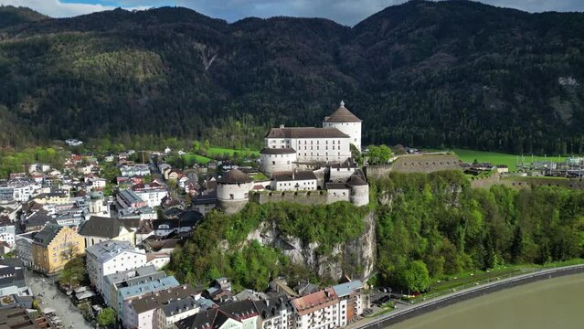 Aerial around view of Kufstein town with medieval Castle fortress in Tyrol, Austria, Alps mountains, 4k