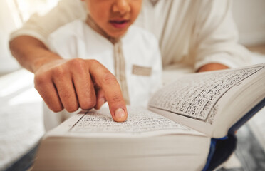 Quran, Islam child or parent hands reading for religion learning, muslim pray and faith in Allah,...