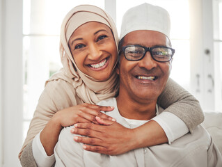 Portrait, Muslim and elderly couple smile, hug and happy for support, trust and care in retirement,...