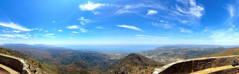 panorama view from the Pico de Los Reales over the coastline of the Costa del Sol towards the...