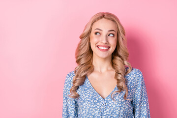 Portrait of dreaming young lady wear stylish blue blouse looking empty space enjoy new shopping deal isolated on pink color background