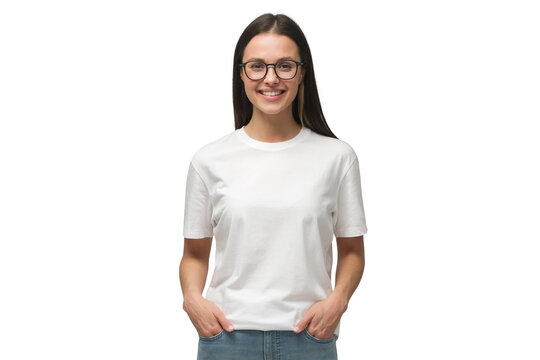 Young smiling woman standing with hands in pockets, wearing blank white tshirt with copy space