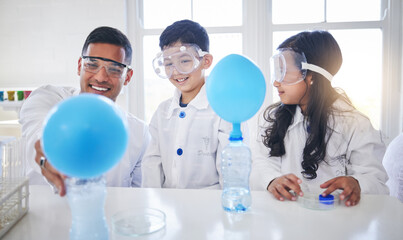 Family, science and father with kids in a laboratory with balloon for chemistry, reaction or experiment. Physics, test and parent with children in lab with bottle for learning, analysis and teaching