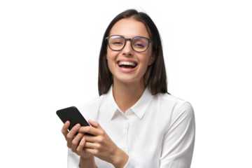 Young business woman laughing while reading text messages from colleagues on her phone, dressed in white collar shirt