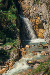 A big waterfall in the gorge Wolfsklamm in Stans, Tirol - Austria