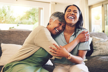 Senior mother, funny and hug woman in living room, bonding and laughing together. Happy, elderly...