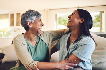 Funny, senior mother and hug daughter in home, bonding and laughing together. Happy, elderly mom and embrace woman, relax and smile with care, love and enjoying time on living room sofa with family. - obrazy, fototapety, plakaty