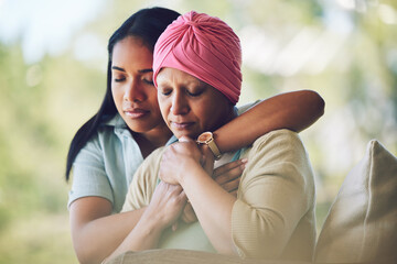 Love, sweet and woman with her mom with cancer hugging, bonding and spending time together. Recovery, chemotherapy and sick mature female person embracing her adult daughter in an outdoor garden. - obrazy, fototapety, plakaty
