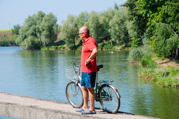 cyclist with sport bike outdoor. summertime activity recreation and active lifestyle. weekend...