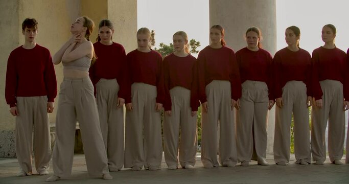 Professional dancing group of young people performing an interpretive dance, 4k
